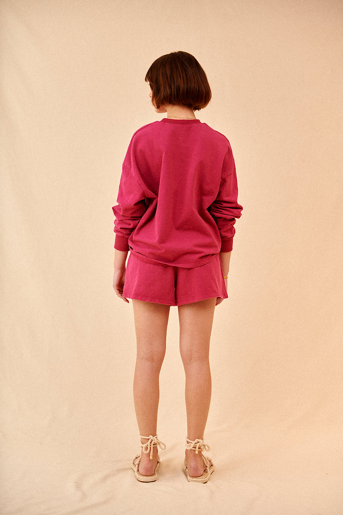 Short rose sangria coupe ample taille élastique avec poches en coton garance paris vêtement femme